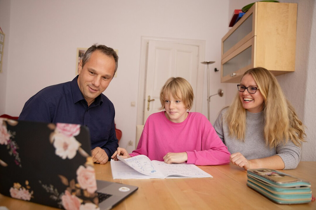 family reviewing household budget